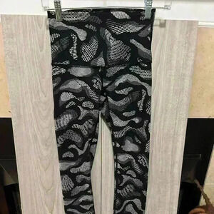 Lululemon Women’s leggings. Size 2 per waist measurements. Black/white.